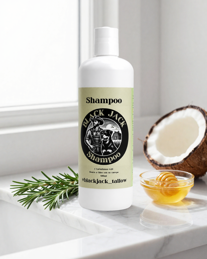 Botella de Shampoo Black Jack Tallow junto a coco, miel y romero, ingredientes naturales, sobre repisa junto a la ventana

